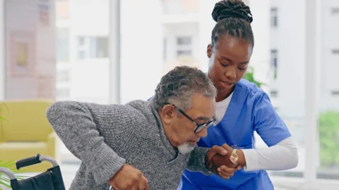 Caregiver supporting a resident with patience and care in our Lake Stevens home