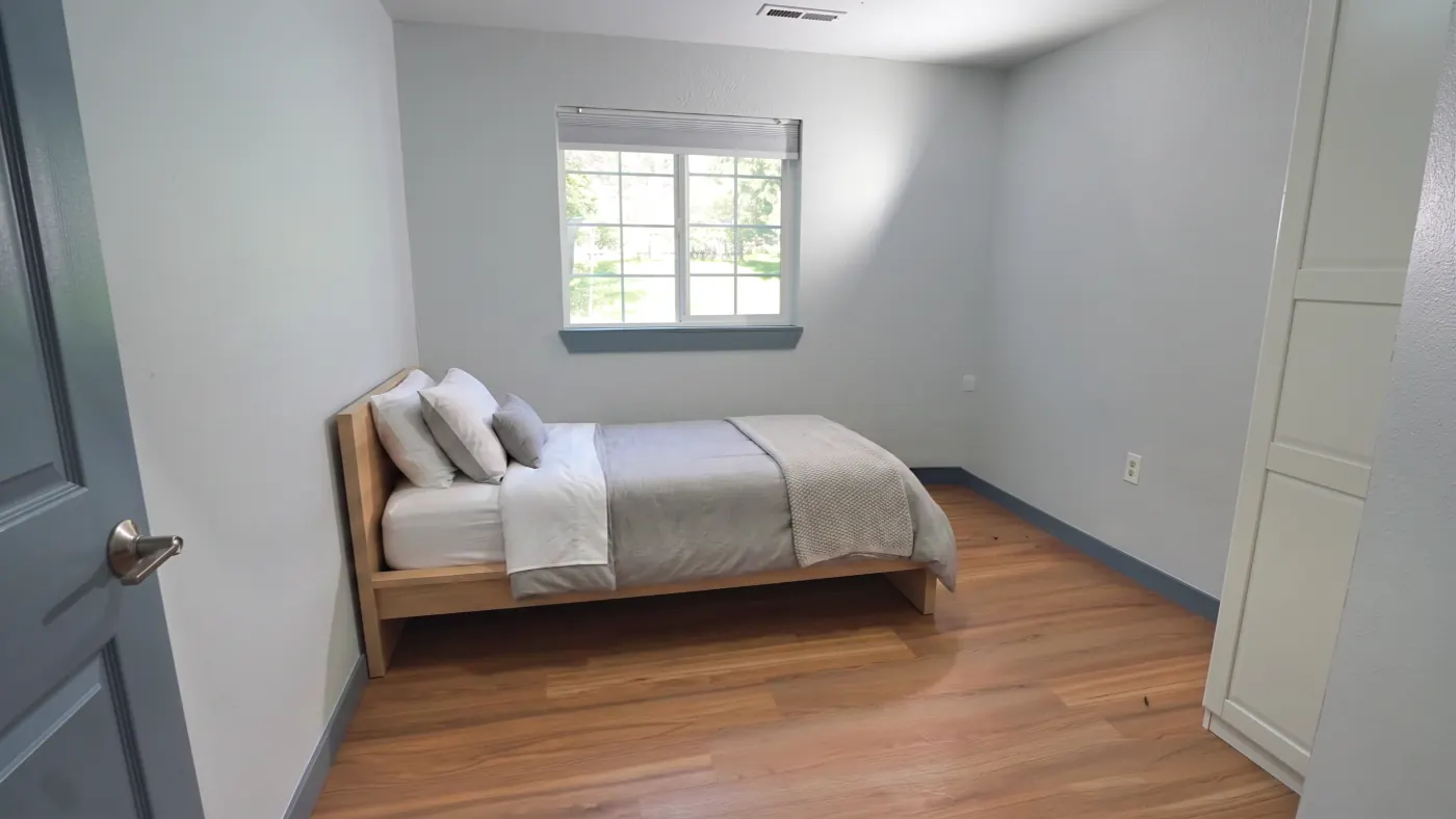 Private bedroom with double bed and garden view