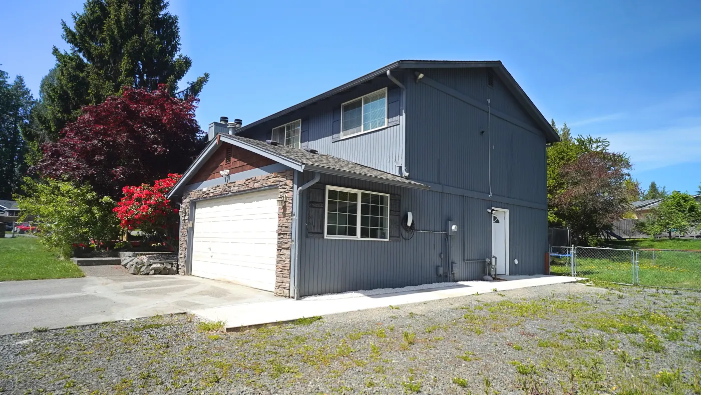 Side view of the home and garage