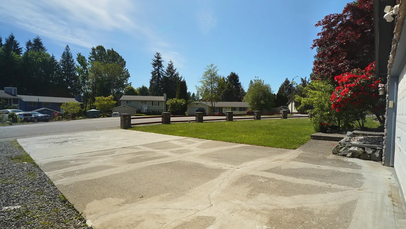 Quiet residential street view from the driveway