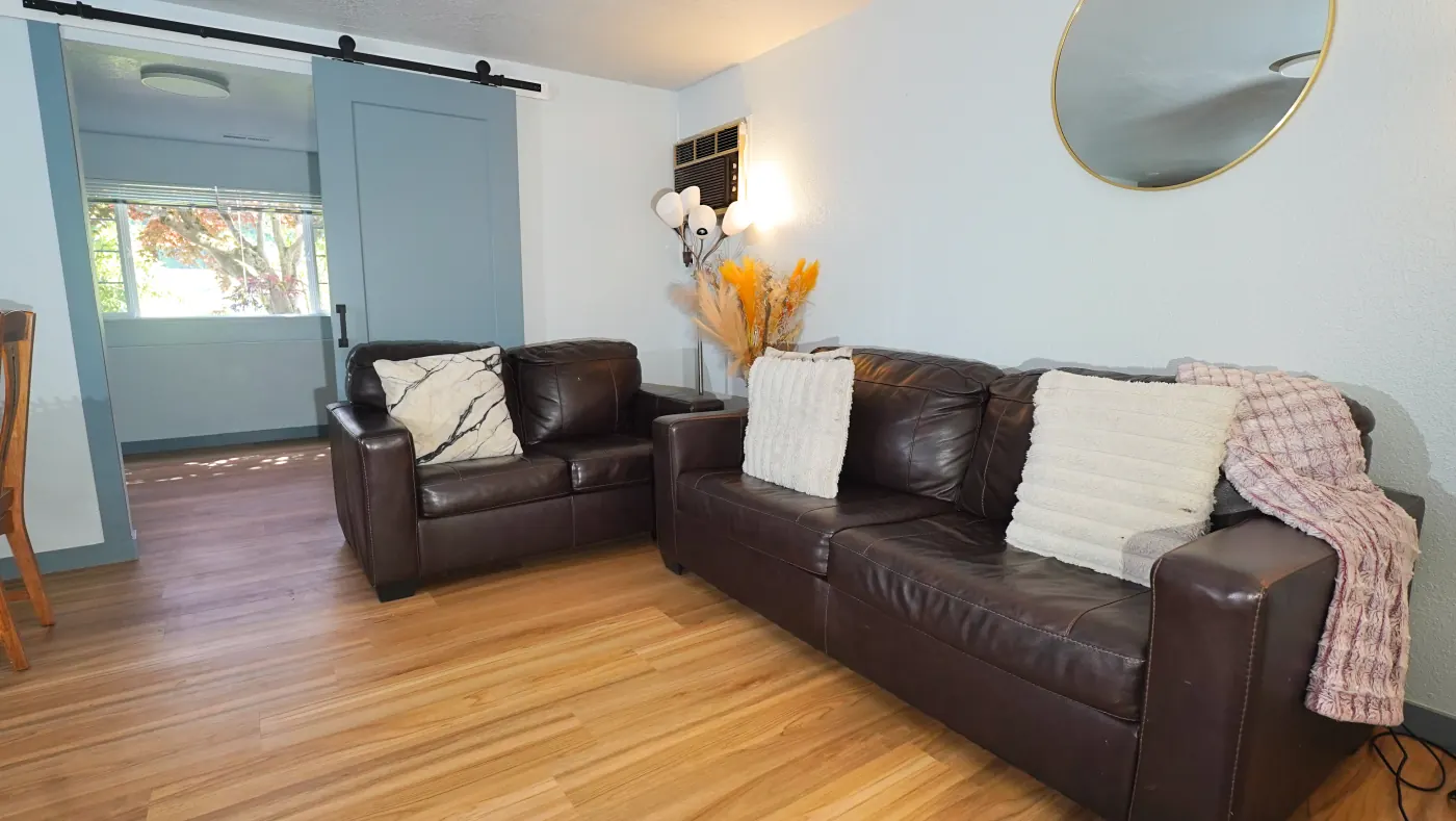 Family lounge with barn door separating private quarters